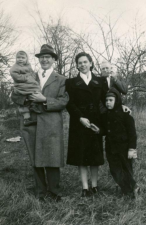 
1944, Edgar holds Barbara while Ed stands by Dorothy.