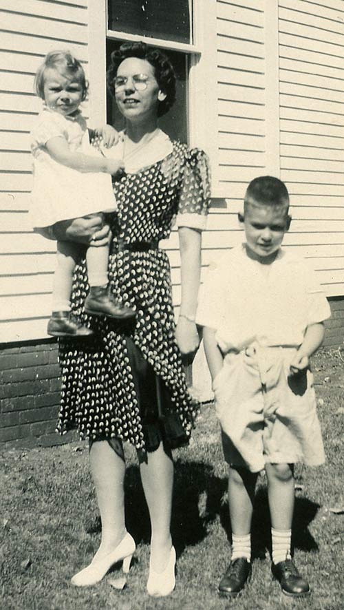 
1944, Dorothy holding Barbara with Ed nearby.
