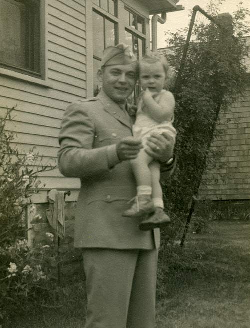 1944, Uncle Edwin Kurtz, U.S. Army Lieutenant, holding a young Barbara.