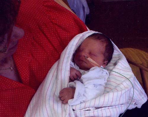 Nicholas shortly after birth in May 2004.